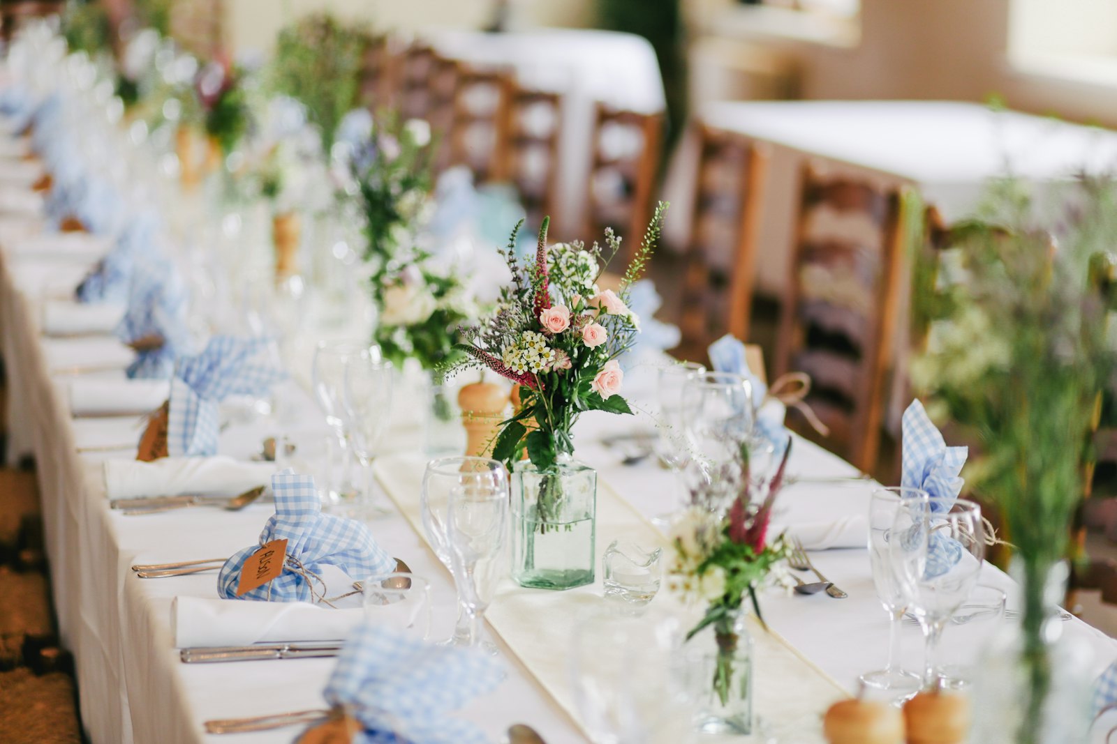 Wedding ceremony setup with chairs facing an arch